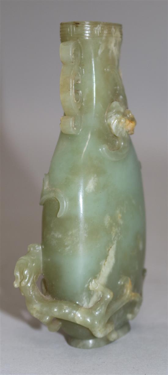 A Chinese archaistic celadon jade vase, Qianlong / Jiaqing period, 11.4cm